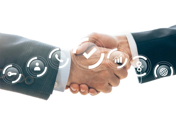 Vista cortada de empresários apertando as mãos e aprovação, chave e globo sinais ilustração isolado em branco — Fotografia de Stock