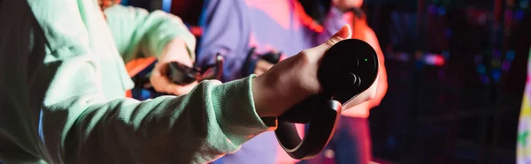 Partial view of teenagers gaming in vr play zone, banner — Stock Photo