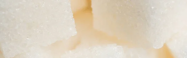 Macro shot of sweet sugar cubes, banner — Stock Photo