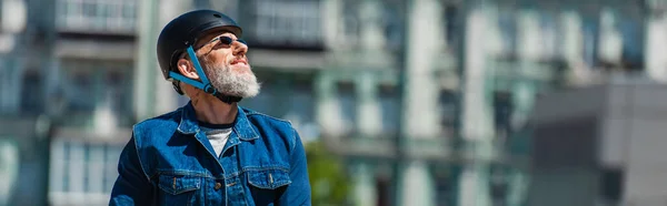 Pleased man in sunglasses and helmet in urban city, banner — Foto stock