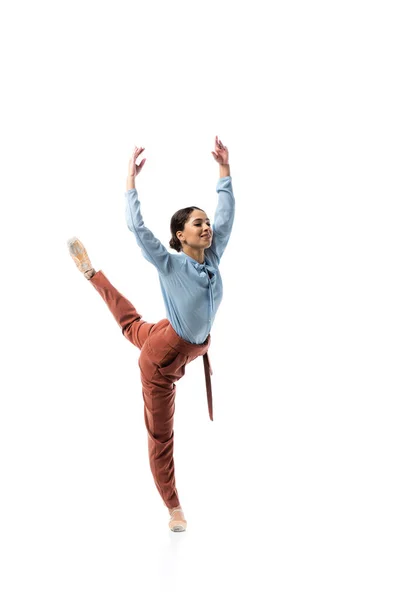 Smiling ballerina dancing isolated on white — Stock Photo