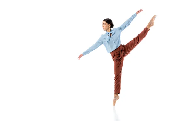 Side view of classical dancer exercising on white background — Stock Photo