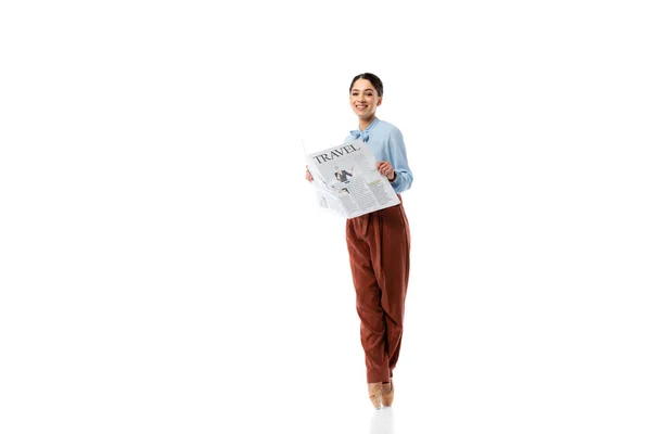 Smiling ballerina with newspaper isolated on white — Stock Photo