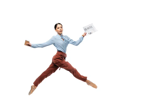 Bailarina com jornal e café para ir pulando isolado em branco — Fotografia de Stock