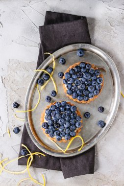 Tartlets with blueberries clipart