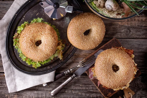 Bagels with bacon and beef — Stock Photo, Image