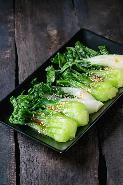 Cooked bok choy with sesame seeds — Stock Photo, Image