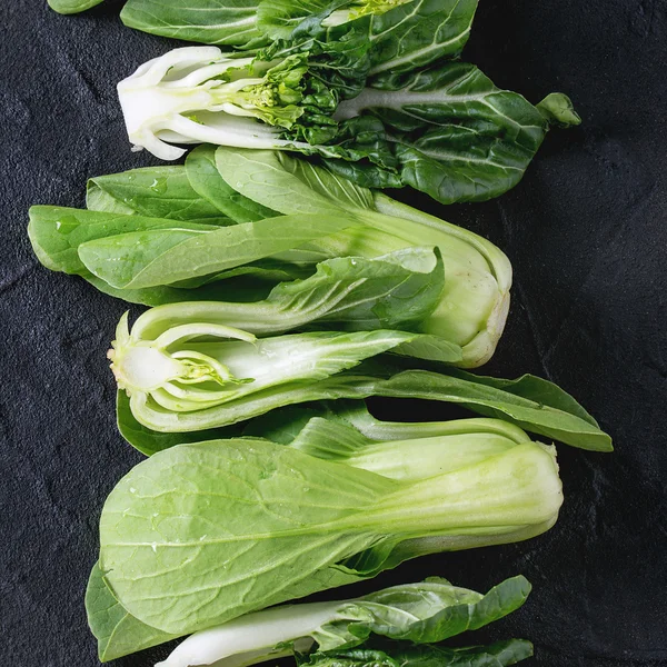 Assortment of raw bok choy — Stock Photo, Image