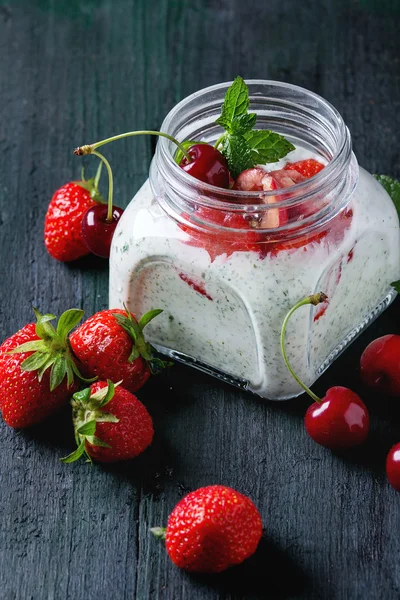 Yogurt with mint and cherry — Stock fotografie