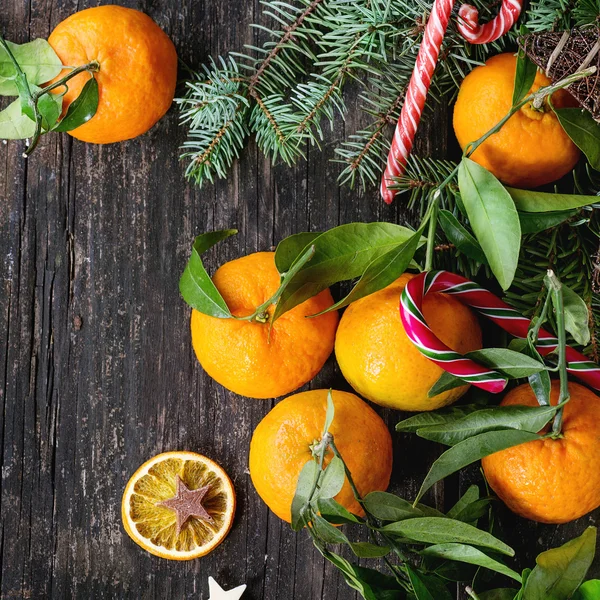 Tangerines in Christmas decor — Stock Photo, Image