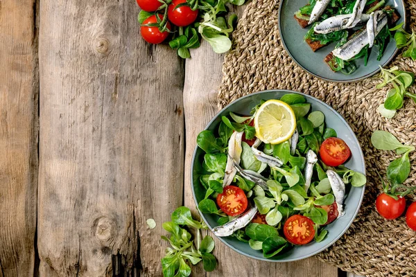 Green Field Salad Pickled Anchovies Sardines Fillet Cherry Tomatoes Served — Stock Photo, Image