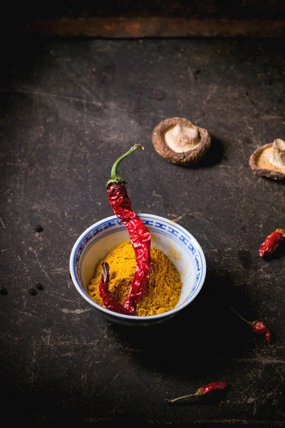 Tumeric powder and red hot chili pepper — Stock Photo, Image