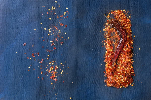 Vločky z red hot chili papričky — Stock fotografie