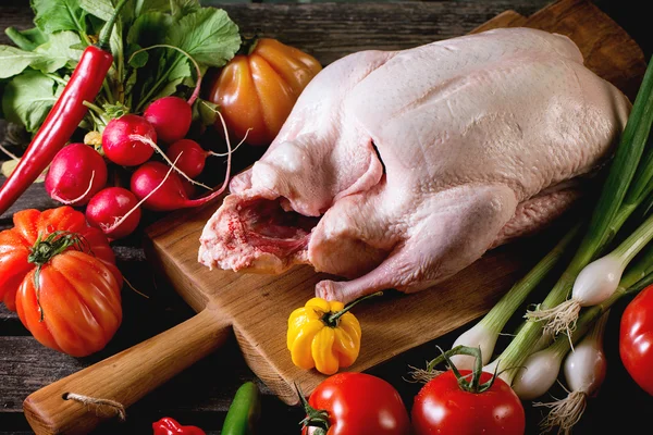 Raw duck with vegetables — Stock Photo, Image