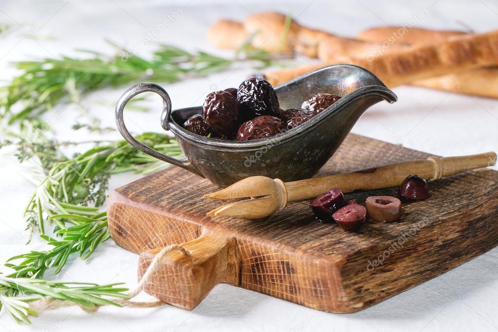 Black olives and grissini bread