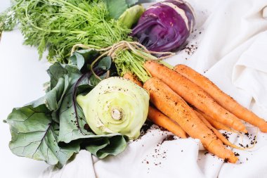 Bundle of carrots and kohlrabi