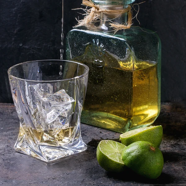 Tequila and limes — Stock Photo, Image