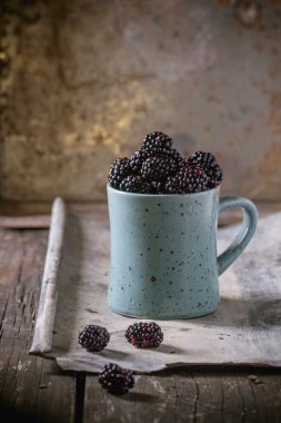 Mug of blueberries