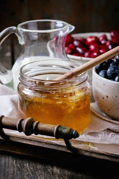 Honey, milk and berries — Stok fotoğraf