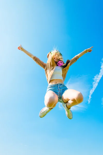 Kipping girl outdoors in spring — Stock Photo, Image