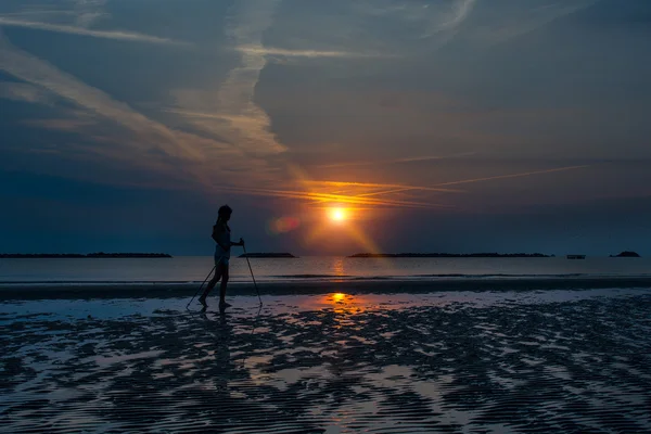 Nordic walking on the beach at sunrise — Stock Photo, Image