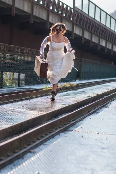 Bride escaping — Stock Photo, Image