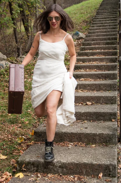 Bride escaping — Stock Photo, Image