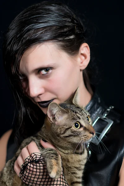 Dark girl with cat — Stock Photo, Image