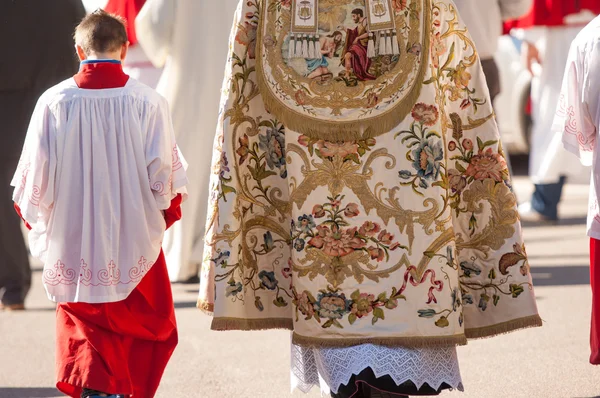 Altar boy and priest — Stock Photo, Image