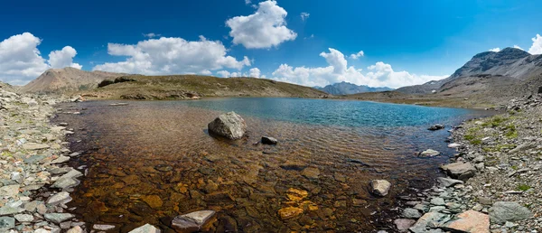 Panrama of a small mountain lake — Stock Photo, Image