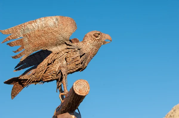 Particular of a wood eagle in the mountain — Stock Photo, Image