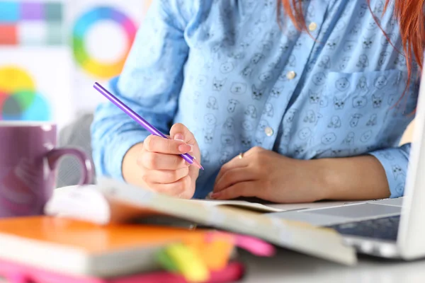 Female student or designer making sketches — Stock Photo, Image