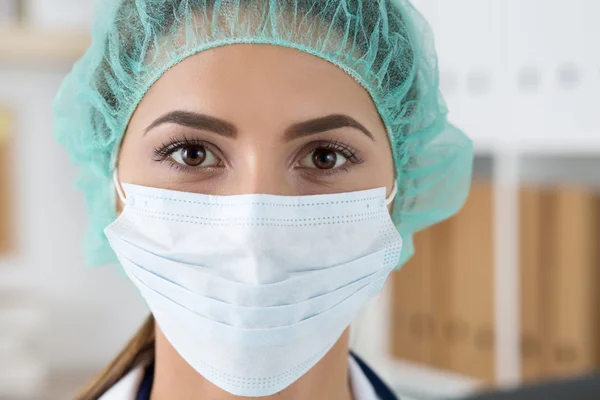 Close-up portrait of young female surgeon doctor — Stock Photo, Image