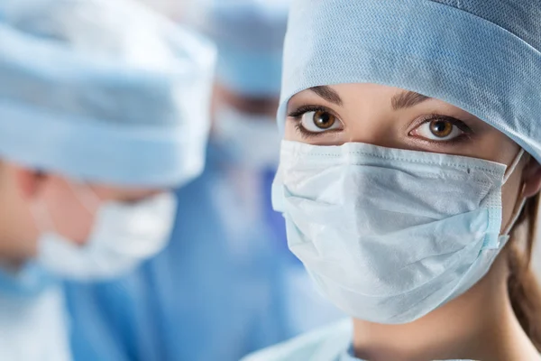 Close-up portrait of young female surgeon doctor — Stock Photo, Image