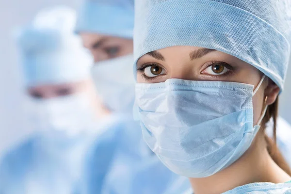 Close-up portrait of young female surgeon doctor — Stock Photo, Image