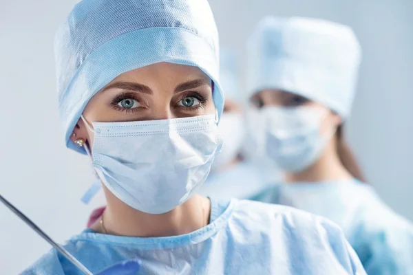 Close-up portrait of young female surgeon doctor — Stock Photo, Image