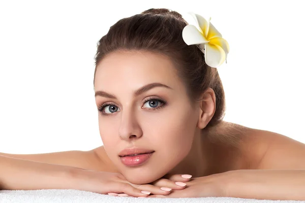 Portrait of young beautiful woman laying in spa salon — Stock Photo, Image