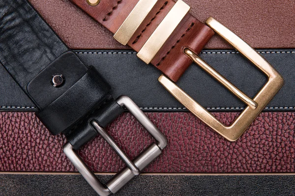 Close-up of two men belts — Stock Photo, Image