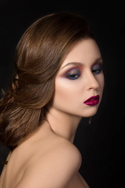 Portrait of young pensive aristocratic woman over dark background — Stock Photo, Image