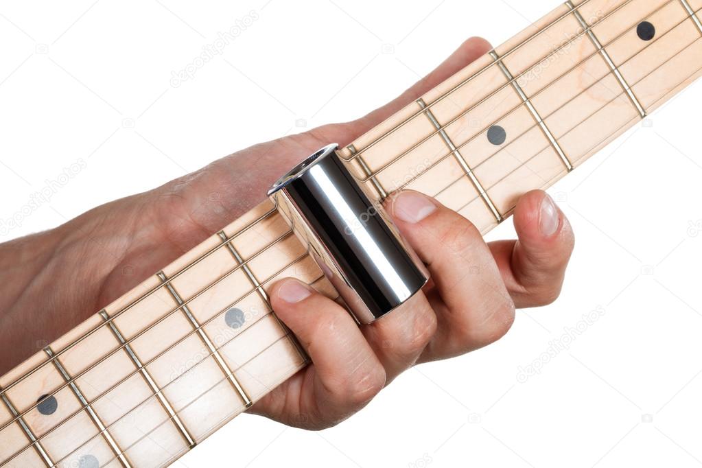 Hands of man playing electric guitar