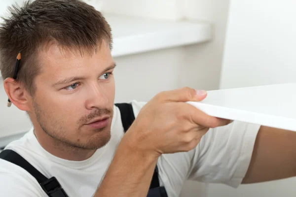 Man Assembling Furniture — Stock Image Man Assembling Furniture Stock Image