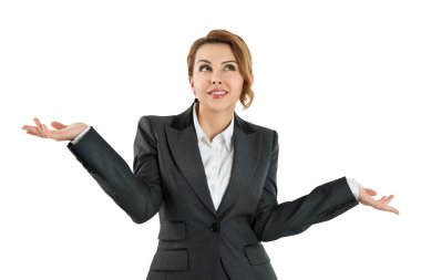 Business woman holding her hands out saying that she does not kn clipart