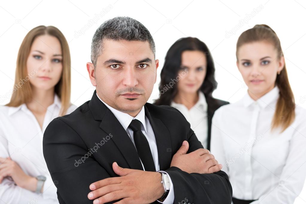  Adult businessman standing in front of his colleagues