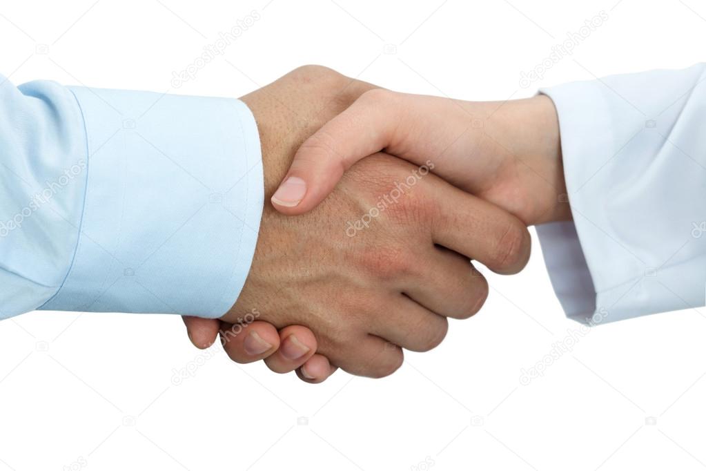 Female medicine doctor shaking hands with male patient