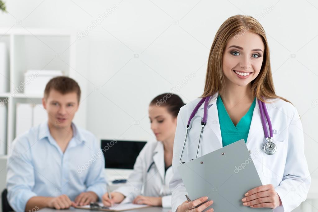 Portrait of smiling female medicine doctor
