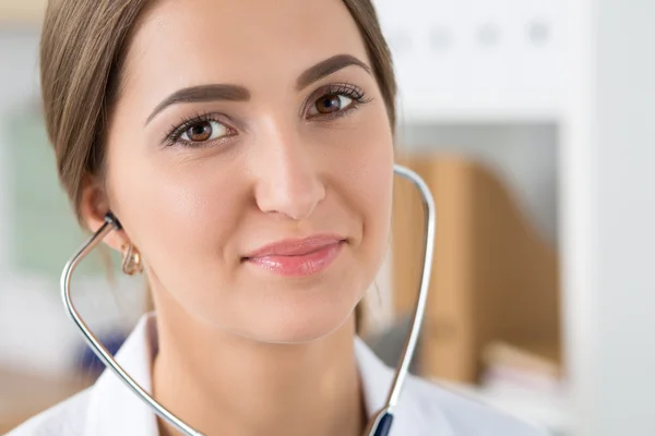 Close-up portrait of beautiful female doctor with stethoscope — Stock Fotó