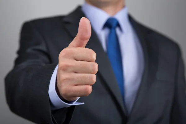 Close up of business man hand with thumb up — Stock Photo, Image