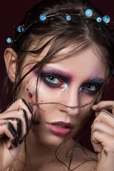 Beauty portrait of a young girl with fashion creative make-up — Stock Photo, Image