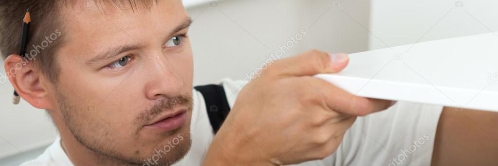 Man Assembling Furniture