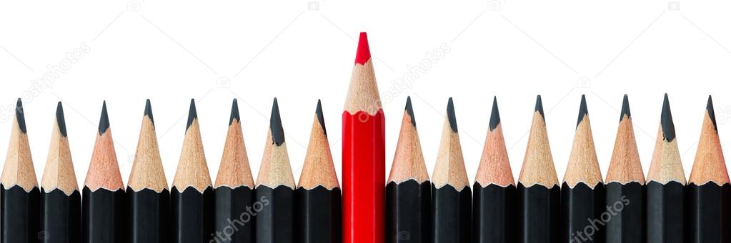 Row of black pencils with one red pencil in middle